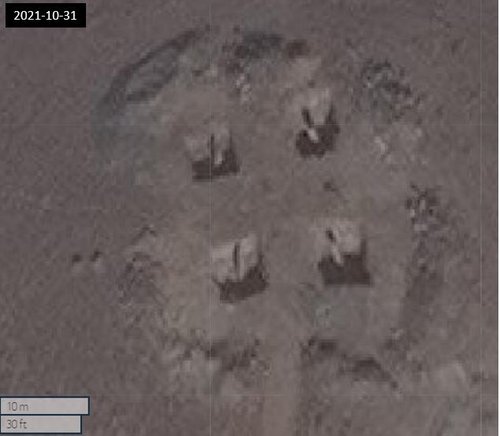 Figure 3.7: Closeup of one of the square areas of the excavations from 2021-10-31 (.35.35677, 69.61188) Maxar