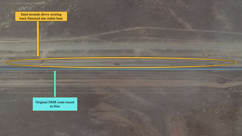 Compare the above image to this one, 25 April 2024. In the same location, the sand heaps are gone and the sand has been spread to the north of the existing track. Imagery via Maxar. Coordinates: 46.83483, 77.84664