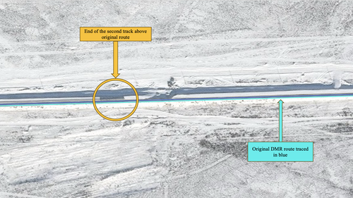 The end of the laid new track on January 17, 2024. Despite the snow, the truck paths to the north of the railway, the numerous access points, and the flatly graded rail bed are still visible. Imagery via Maxar. Coordinates 46.81846, 77.67652